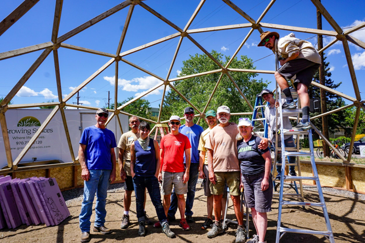 Volunteers building a 26 foot Growing Dome Geodesic Greenhouse