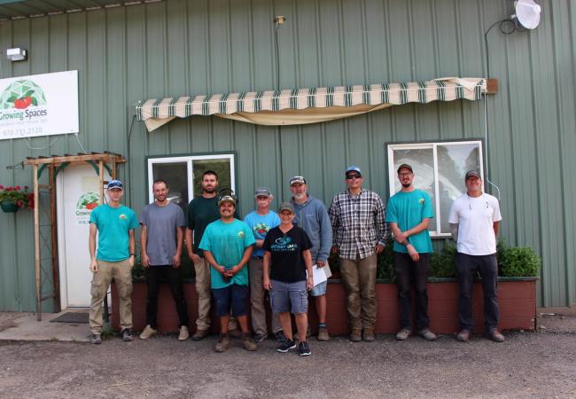 Growing Spaces' Production Team standing outside the shop.