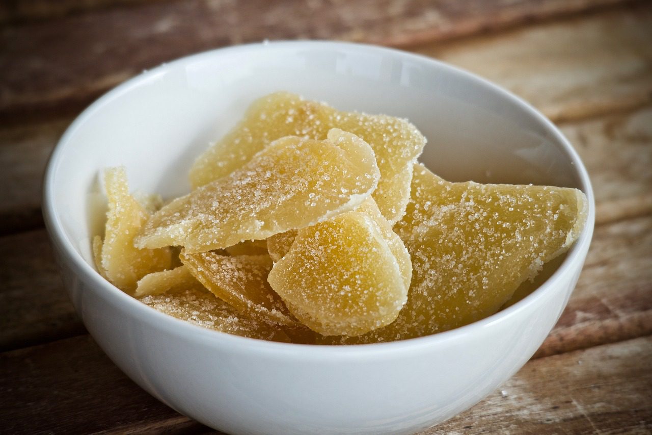 slices of crystalized ginger or mango in a bowl
