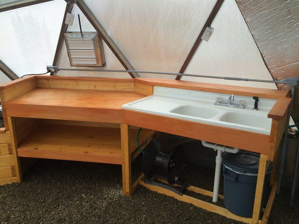 sink and workspace built inside the greenhouse