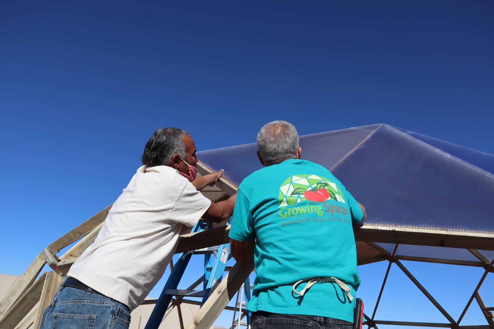 aligning panels on a greenhouse in arizona