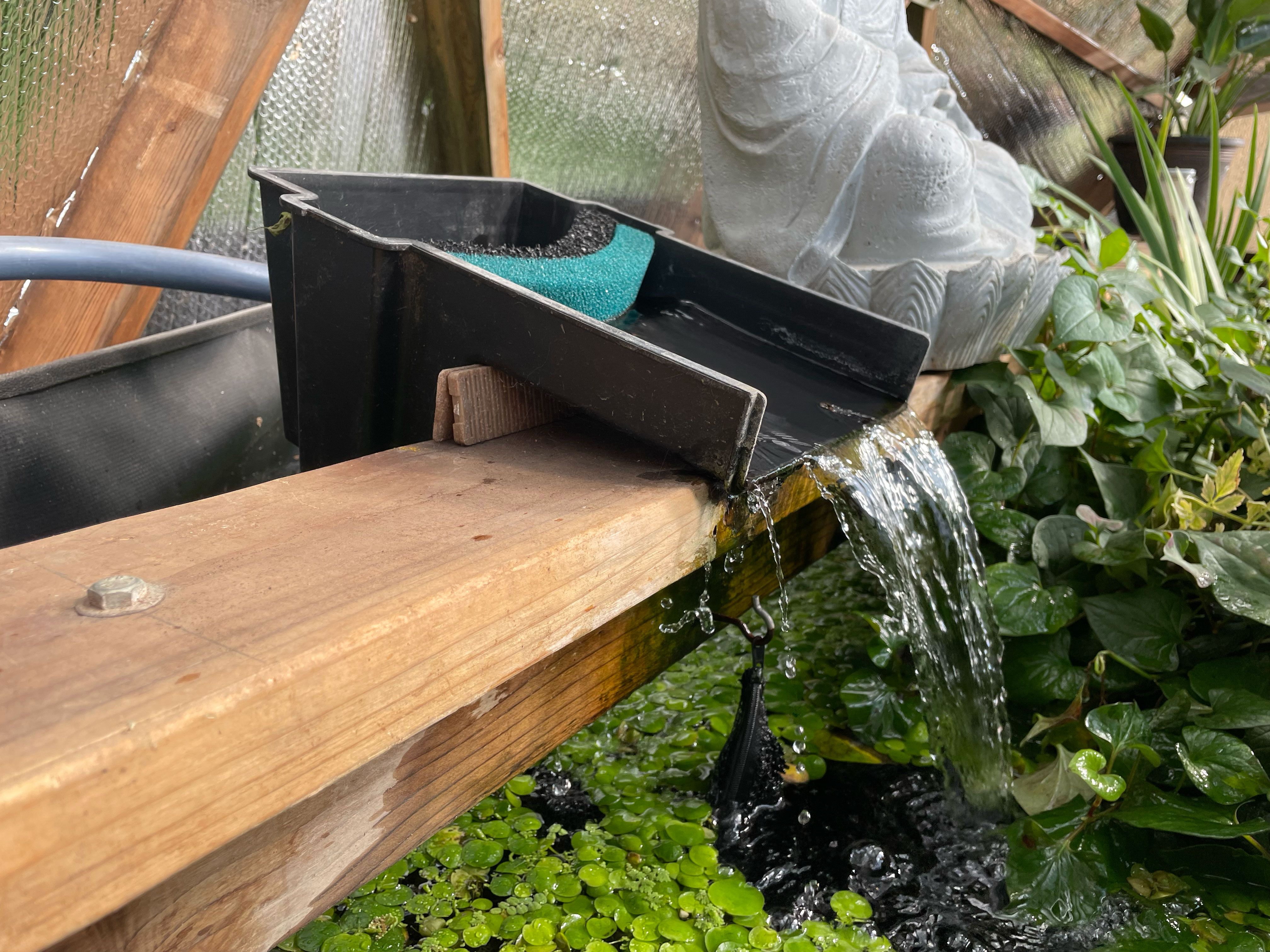 water feature installed above the pond