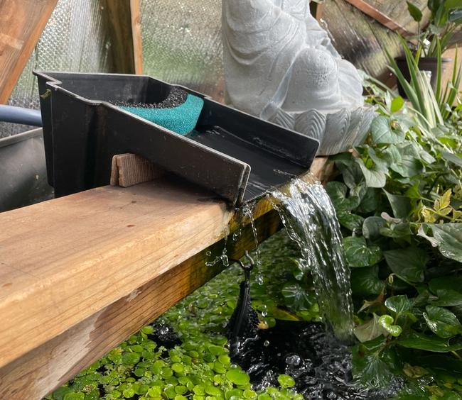 water feature installed above the pond