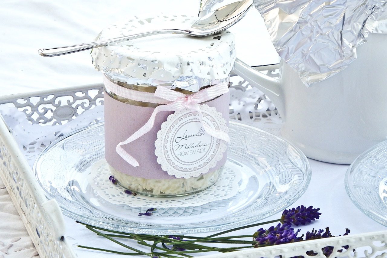 jar of a lavender dessert on a tea tray with sprigs of lavender Pixabay