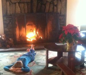 Puja resting by the fire