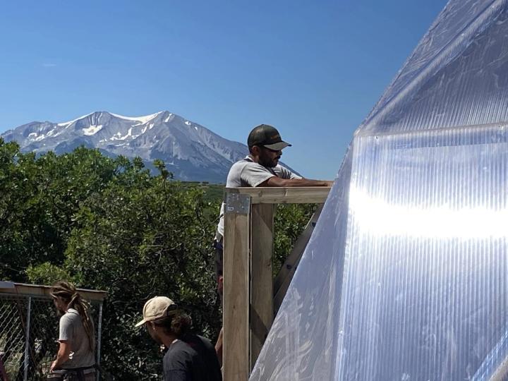 installation crew working on a dome