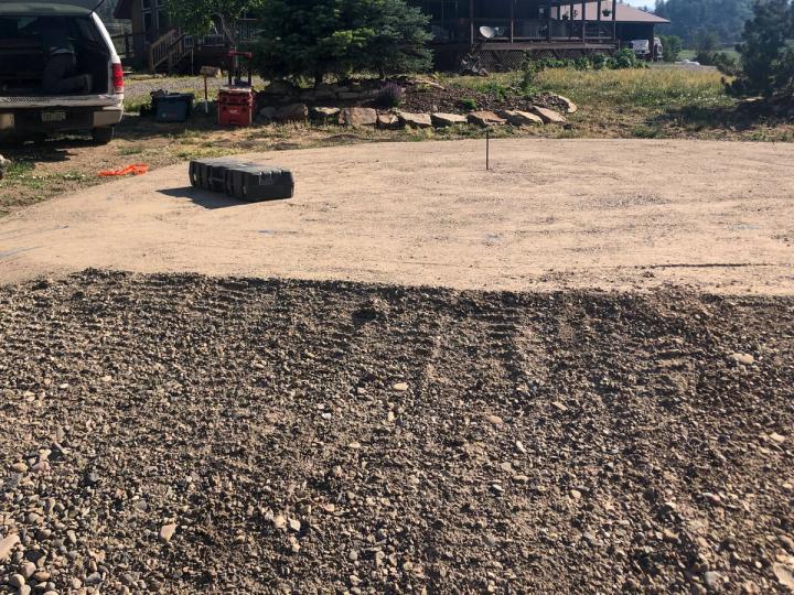 Site preparation for a backyard greenhouse