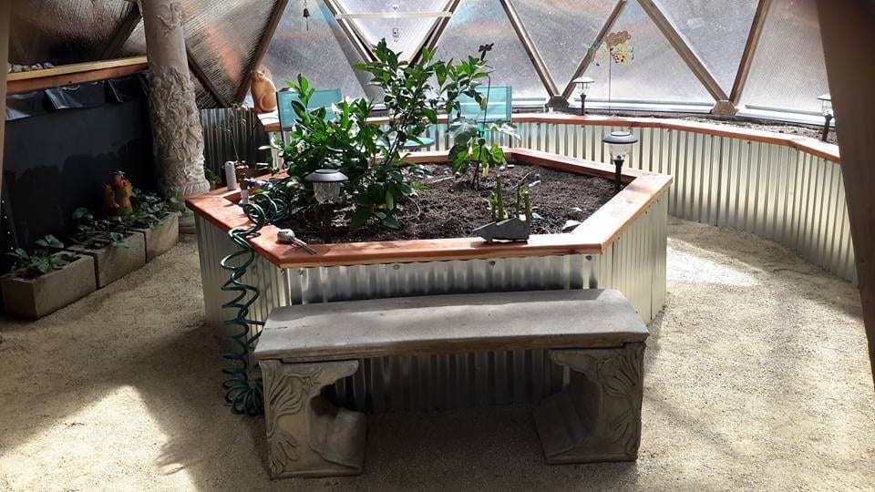 corrugated aluminum used for raised beds in a greenhouse
