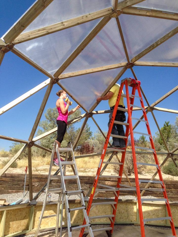 Family installing a Growing Dome