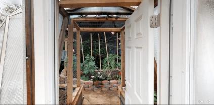 Looking into a Growing Dome Greenhouse through doorway