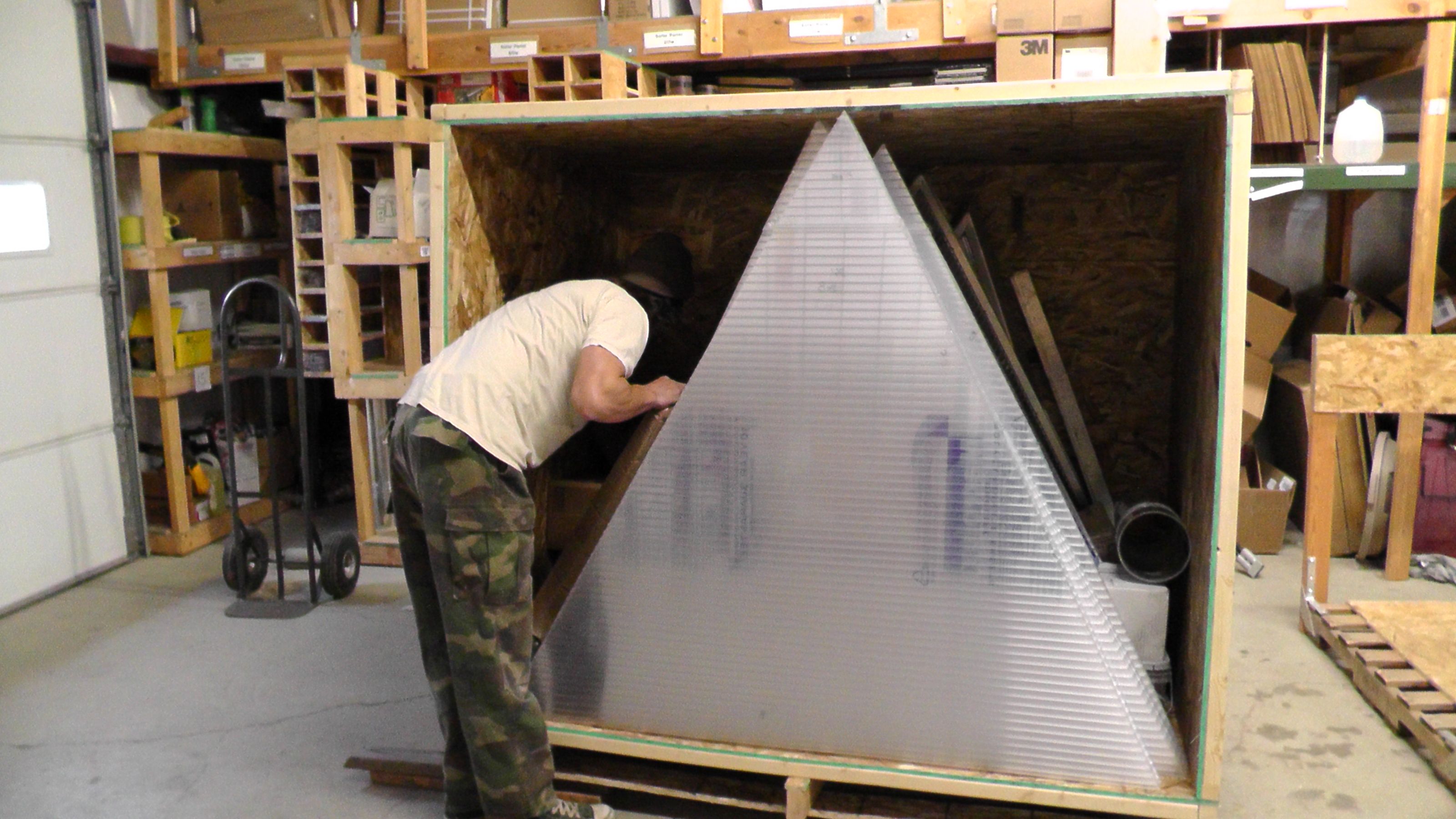 Growing Dome greenhouse kit shipped in crates ready for delivery