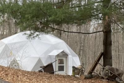 Growing Dome greenhouse in Michigan forest