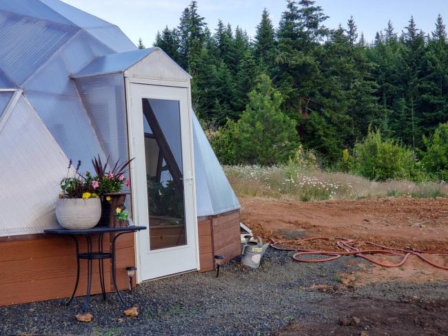 the Kamiah Growing dome amidst the Idaho forest