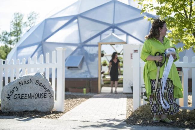 Visitors explore the 42 foot Growing Dome in Waterville Maine