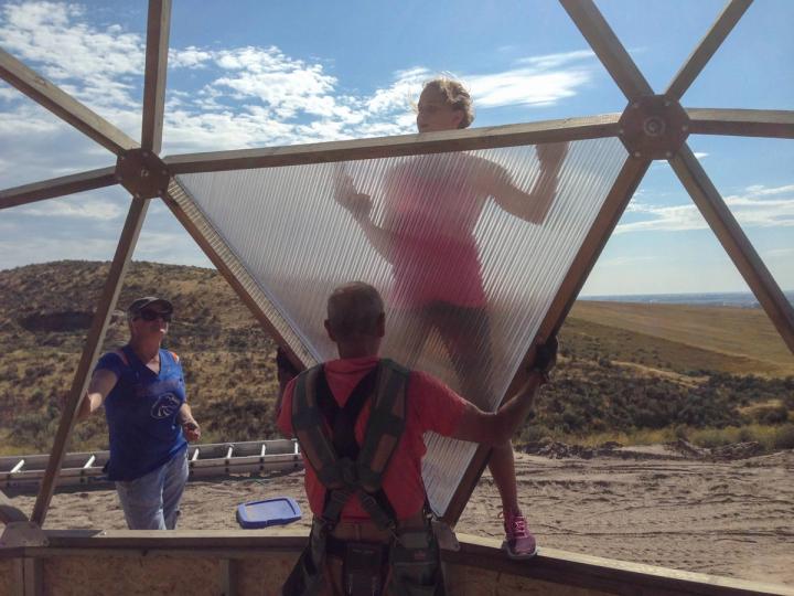 Family installing a Growing Dome