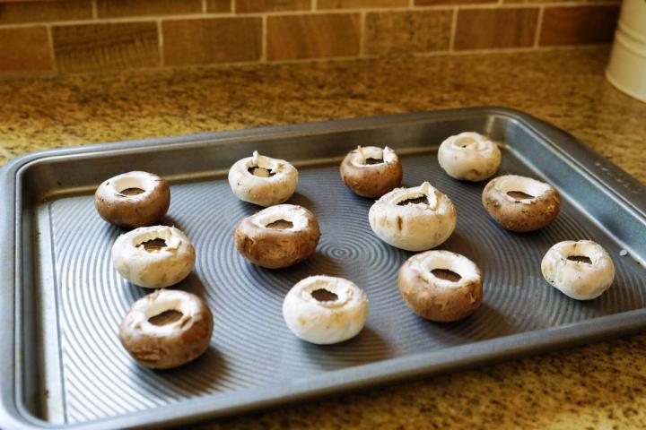 mushroom caps on a tray