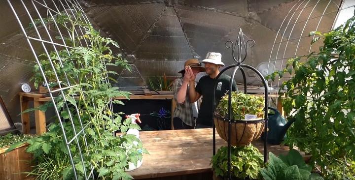 Pine River Garden Club members inside a Growing Dome greenhouse