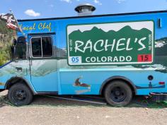 Rachels Food Truck next to the She Shed Greenhouse