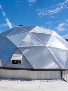 Garfield County School 42 foot diameter growing dome greenhouse with gutter system and concrete foundation