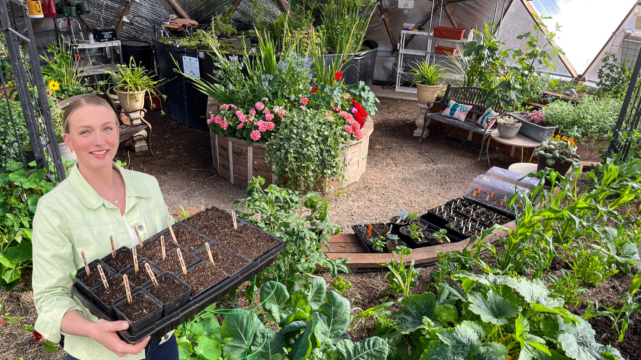 A woman wearing a green jacket