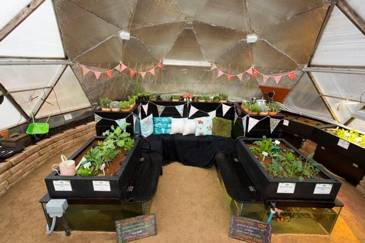 community garden inside a Growing Dome greenhouse