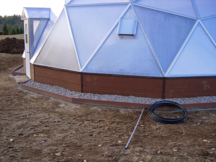 Exterior beds to plant flowers around Growing Dome