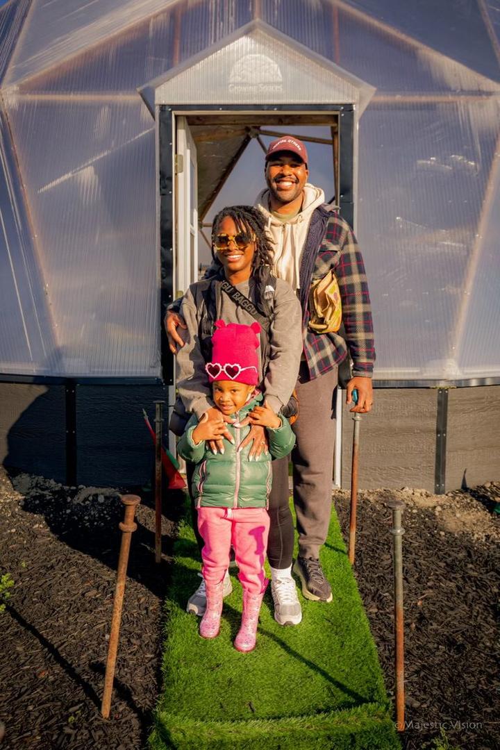 Family outside the Prolific Oxygen Growing Dome Therapy Greenhouse