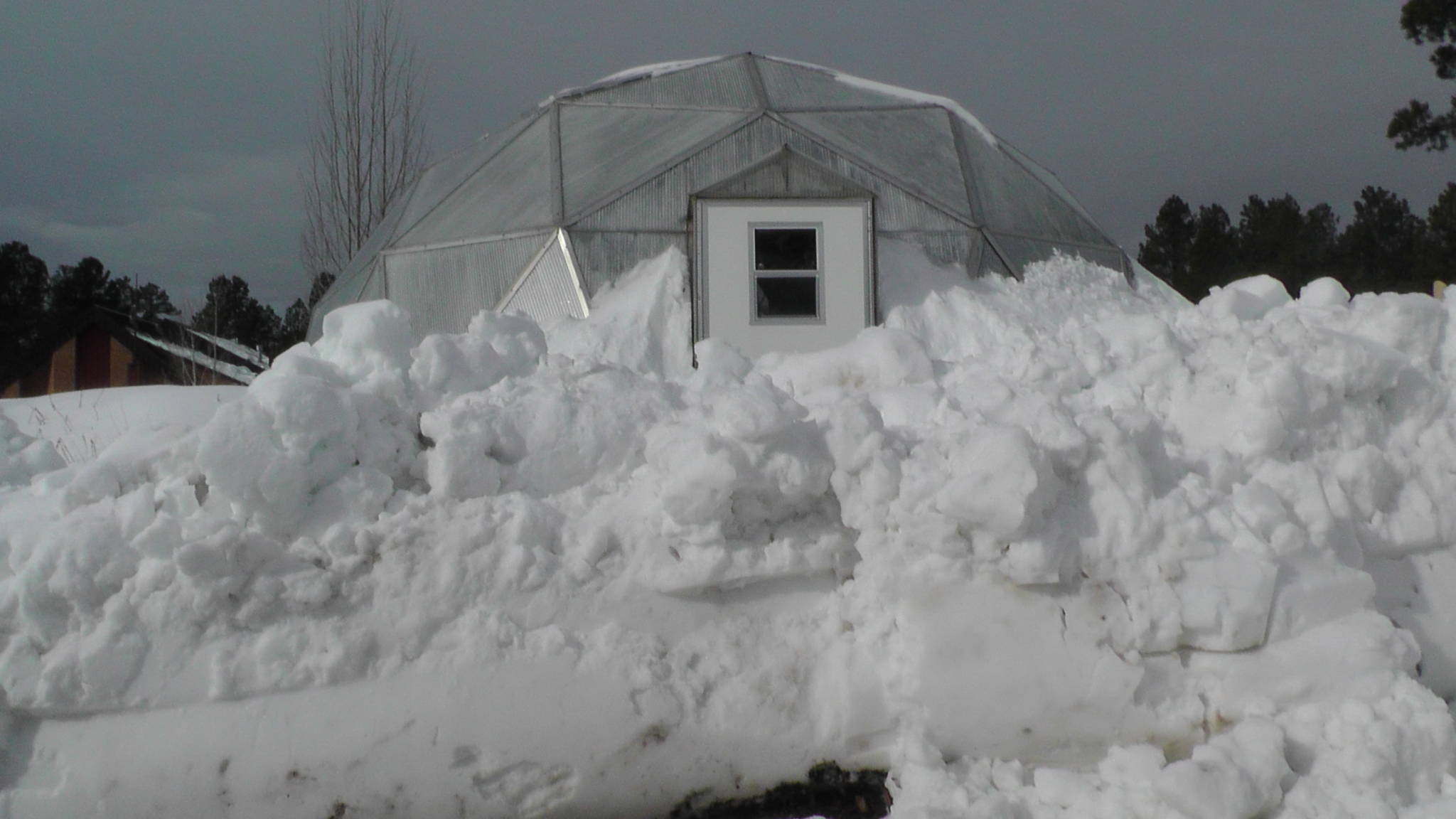 snow garden a growing dome greenhouse  covered in snow in january 2017