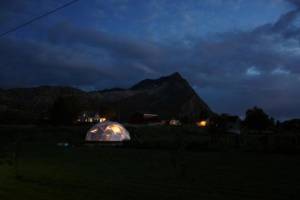 26' Growing Dome greenhouse at night with lights inside