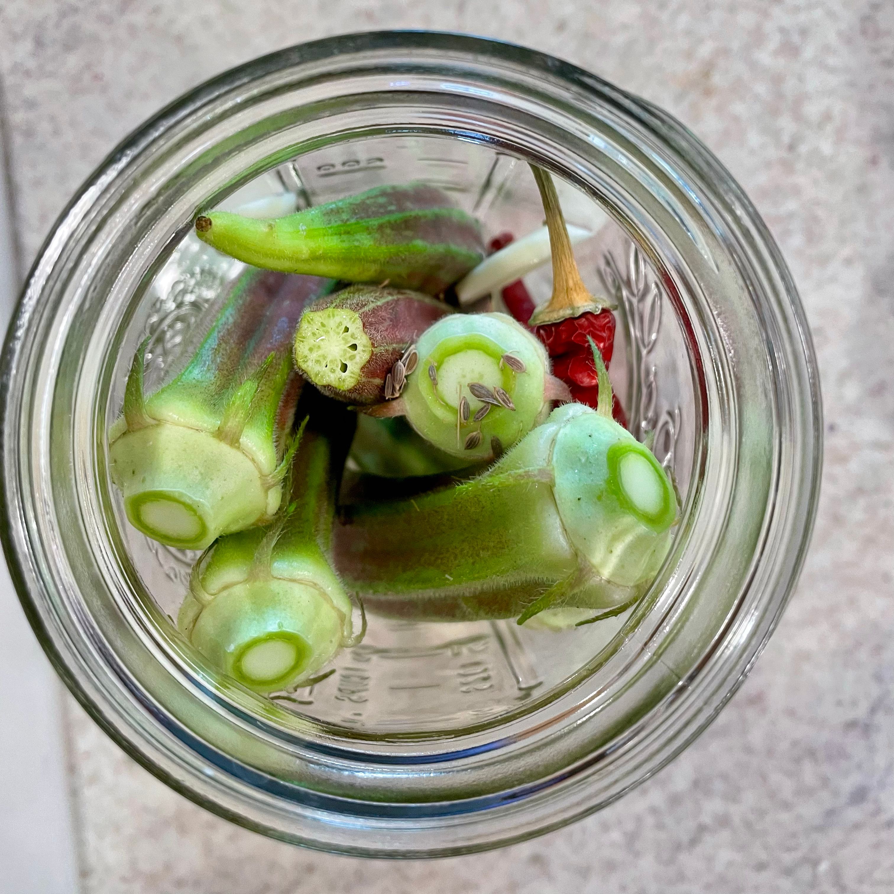 fresh okra in a jar