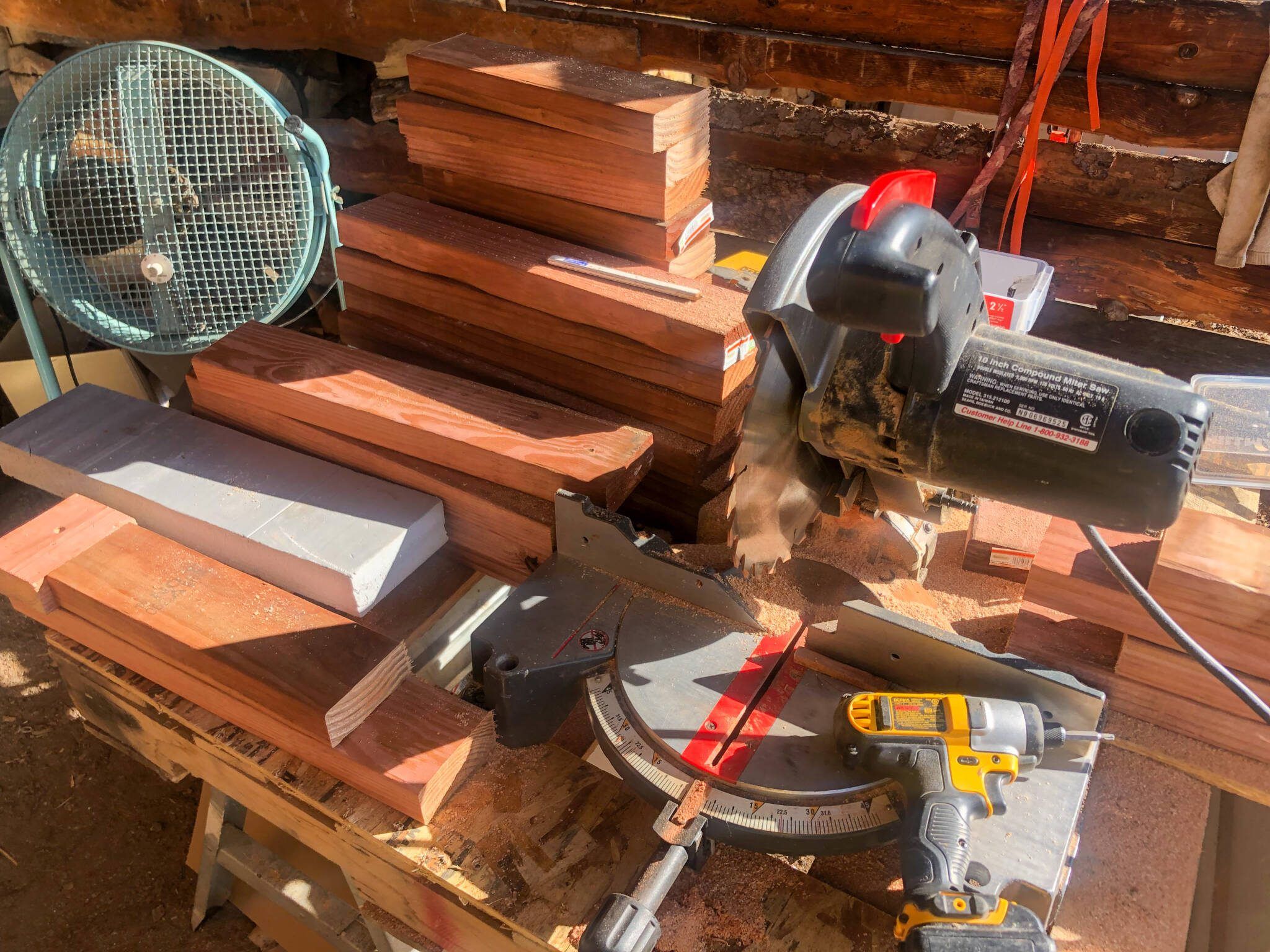 Materials for building garden beds for a backyard greenhouse