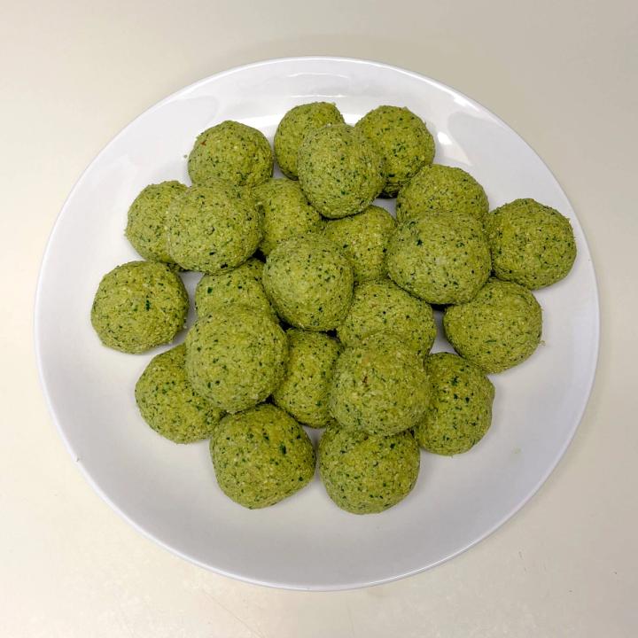 falafel mix formed into balls and piled on a plate