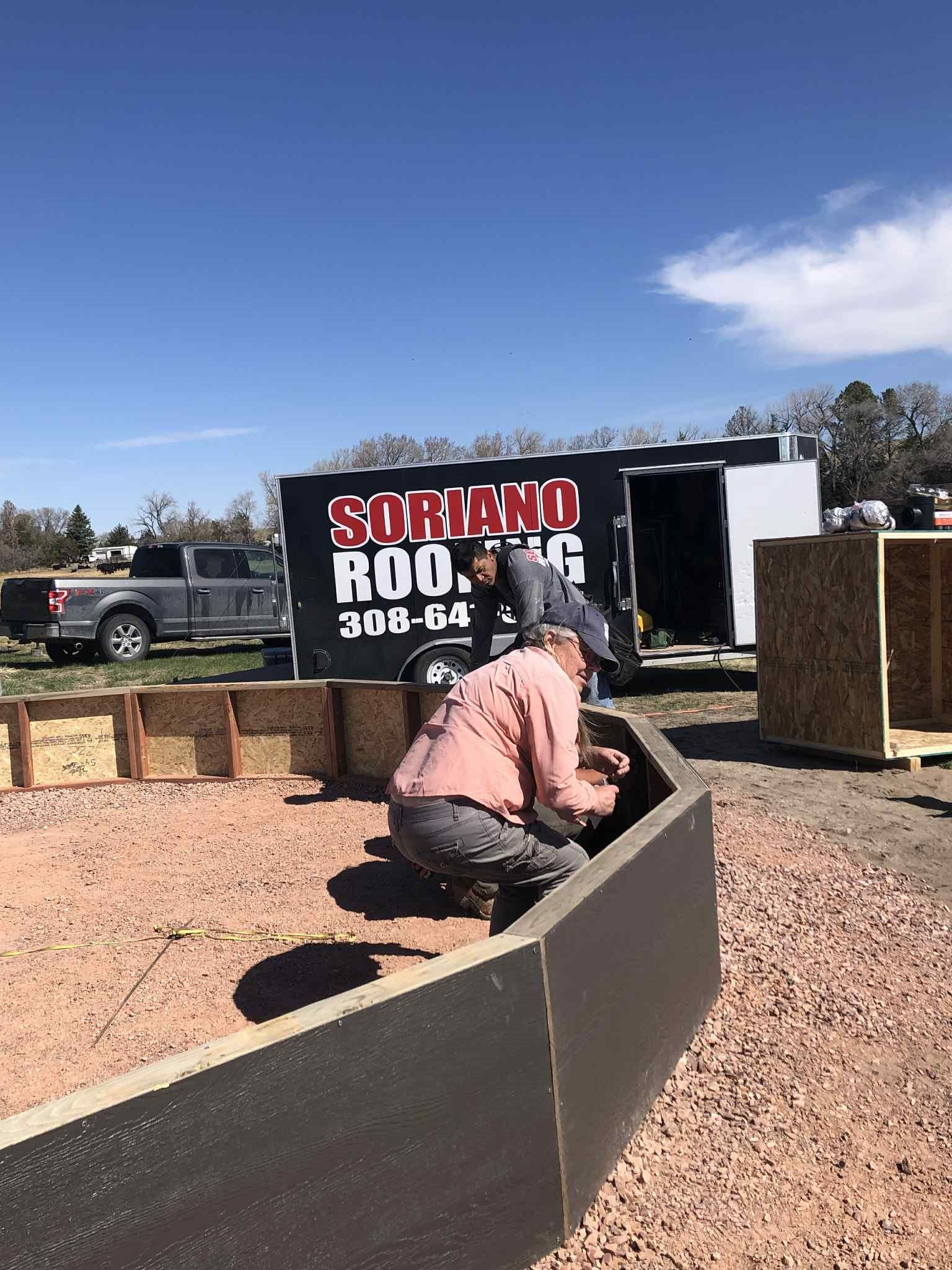 Nielson's Nebraska greenhouse installing the foundation wall