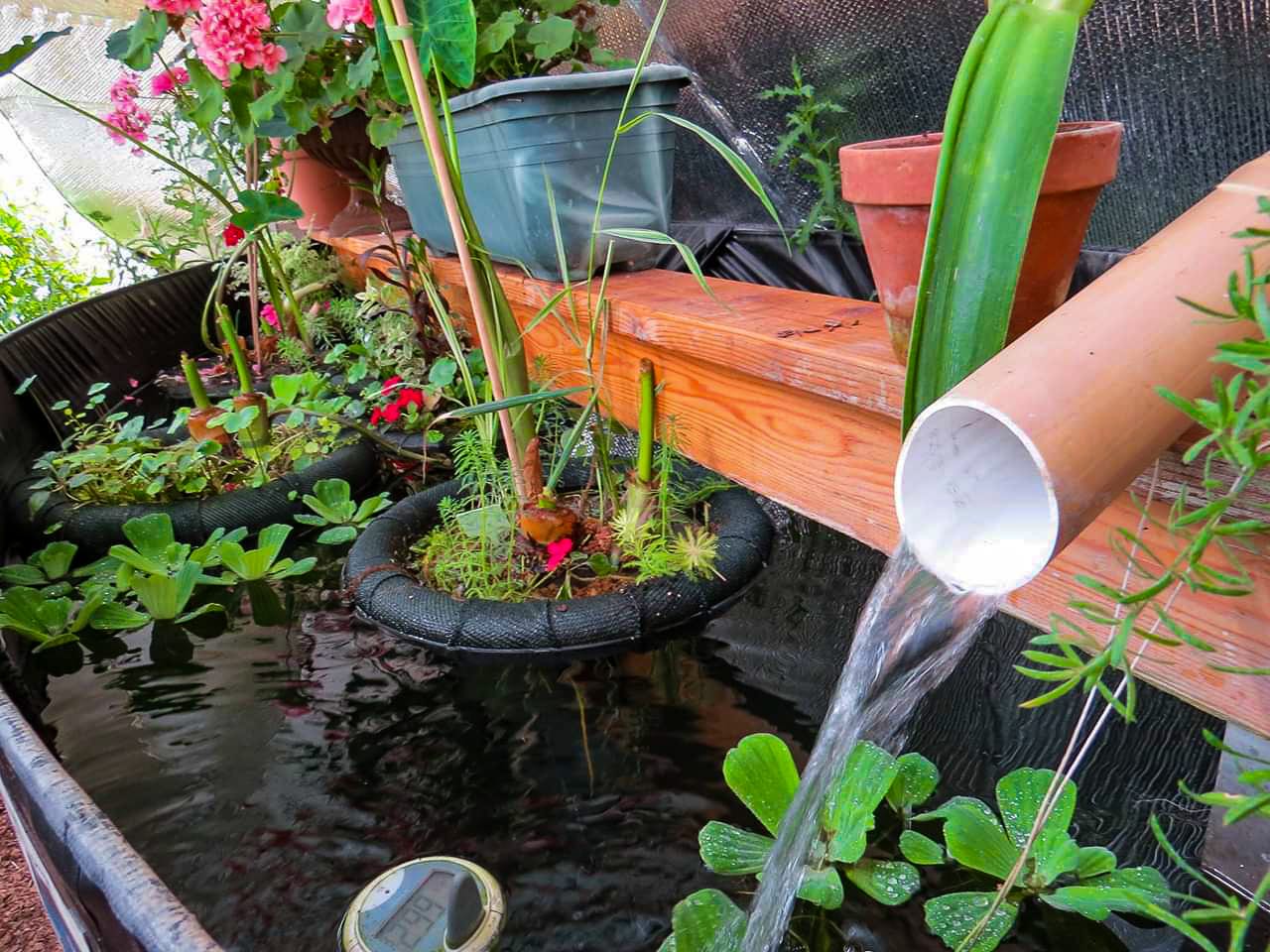 Floating Pond Planters and a bamboo waterfall