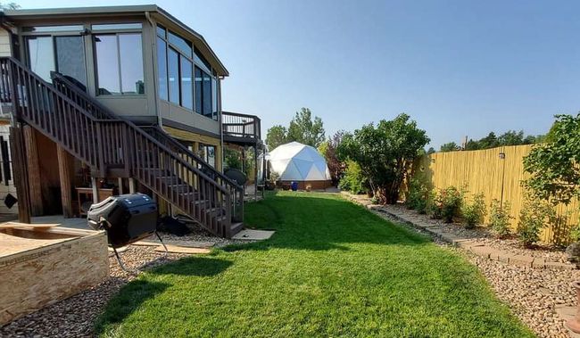 greenhouse in a suburban backyard