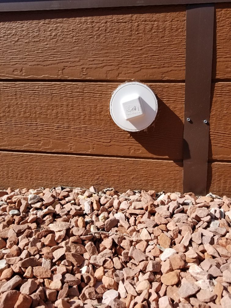 outlet for draining a greenhouse pond