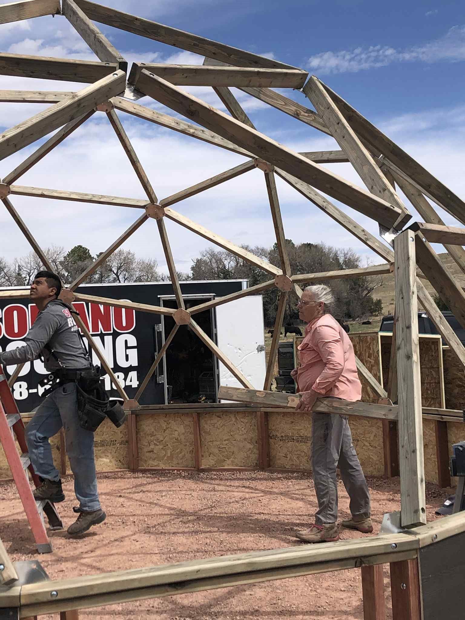 Nielson's Nebraska greenhouse construction with most of the framework erected