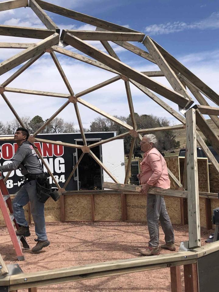Nielson's Nebraska greenhouse construction with most of the framework erected