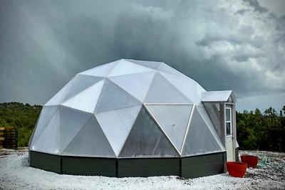 Growing Dome greenhouse surrounded by Wyoming hailstones