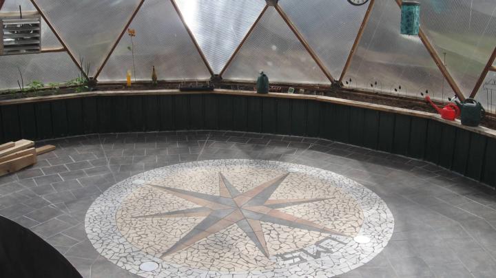 Tile floor for moveable planting carts & pots at a school (33')