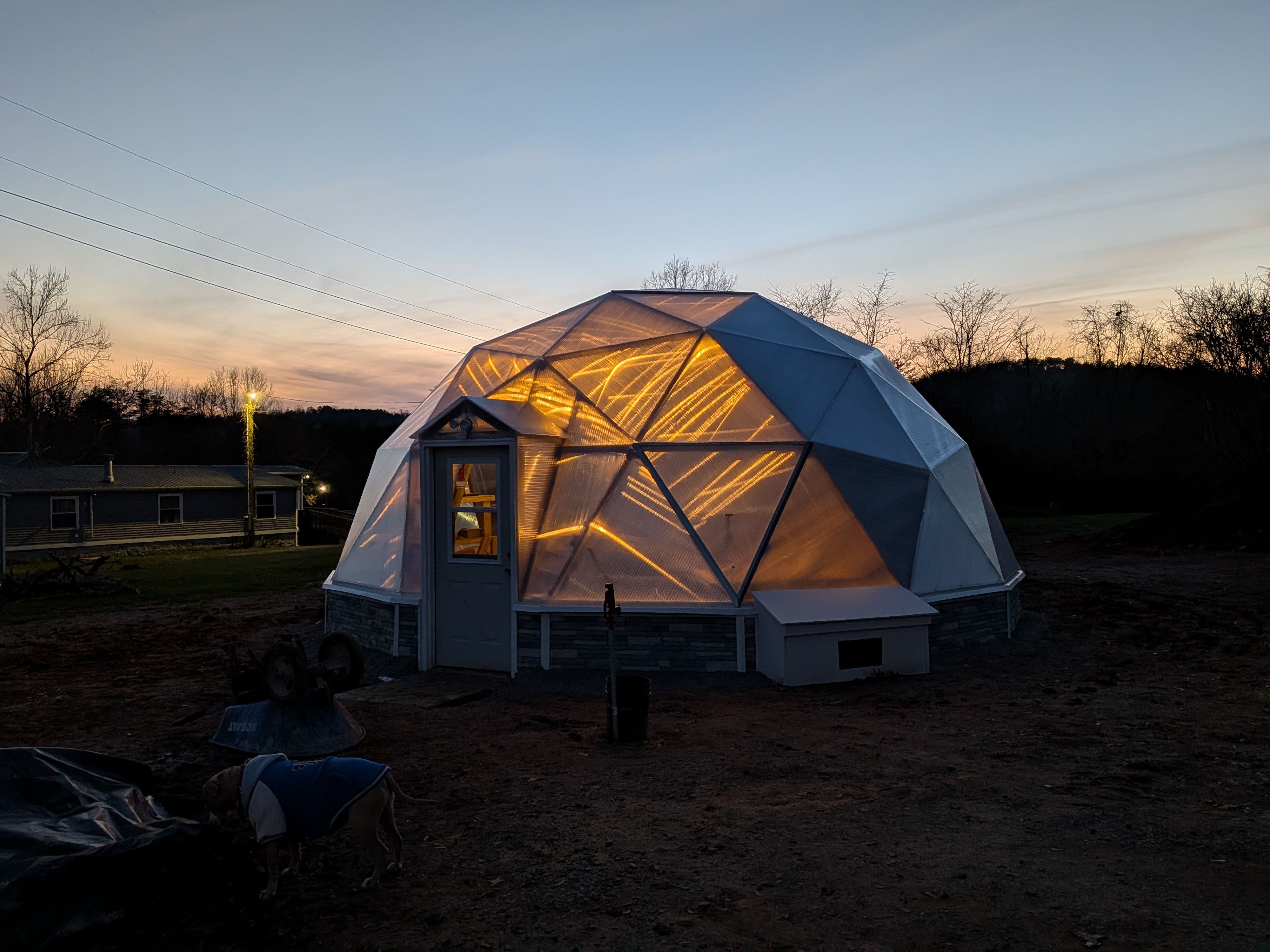 Rays of light reflecting and various angles on the polycarbonate of a growing dome greenhouse
