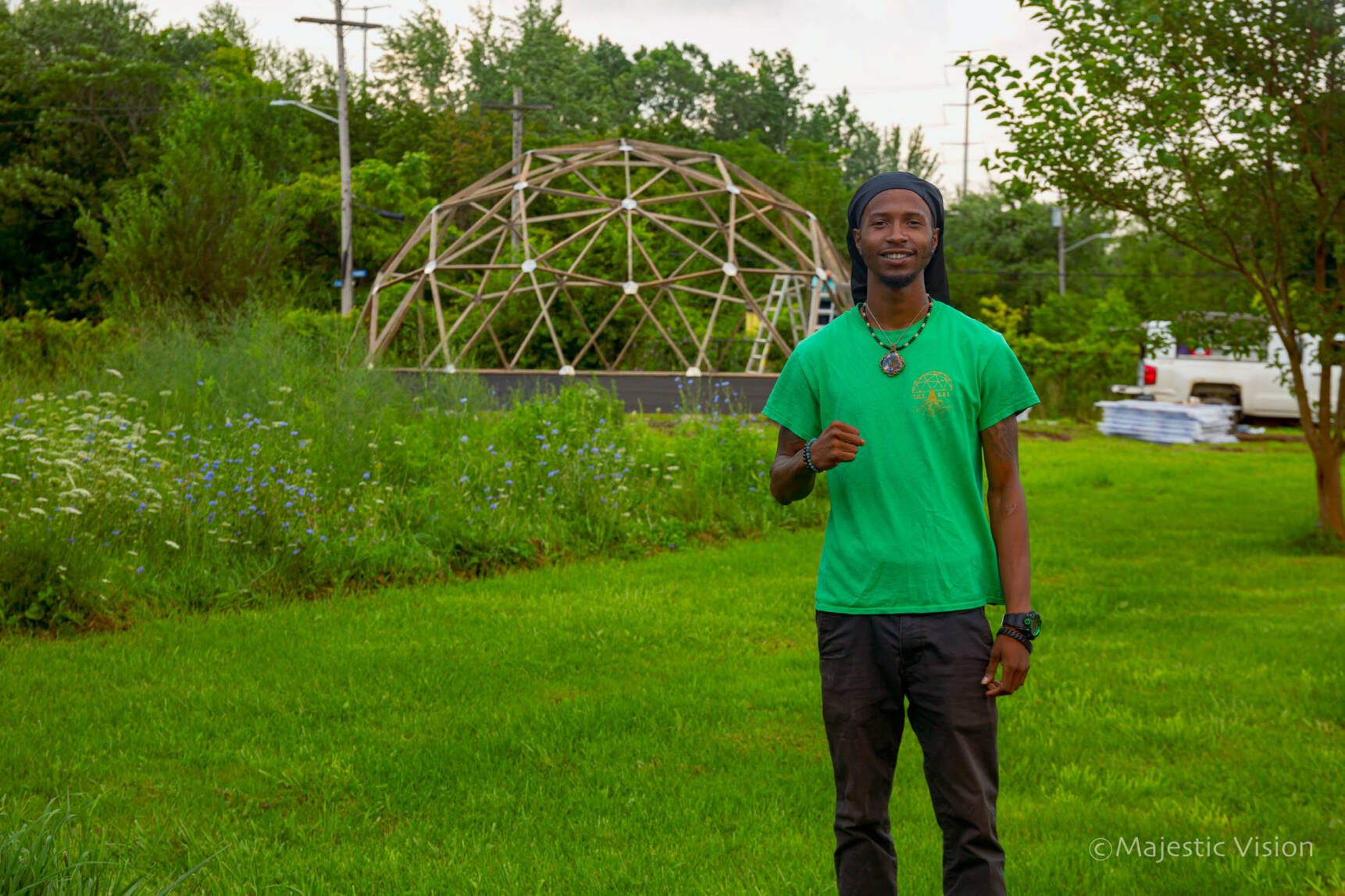 man standing in front of wellness sanctuary being built