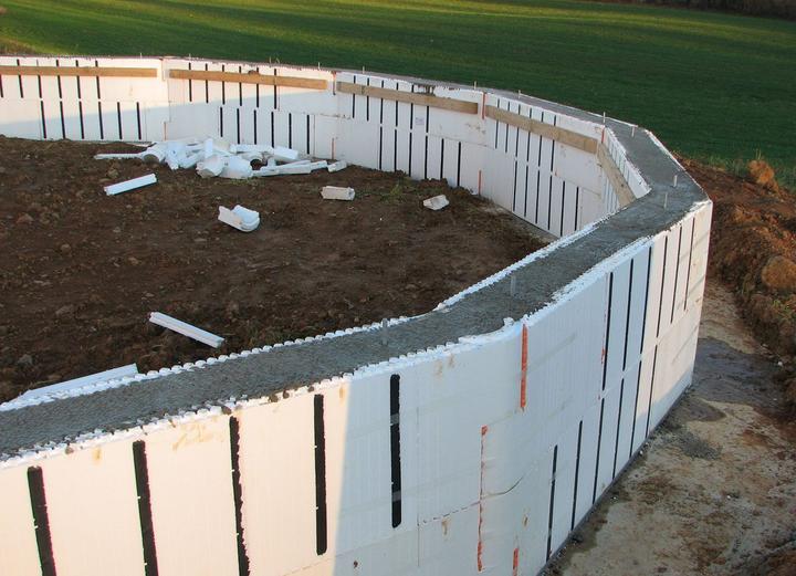 insulated concrete forms filled with concrete for the growing dome foundation