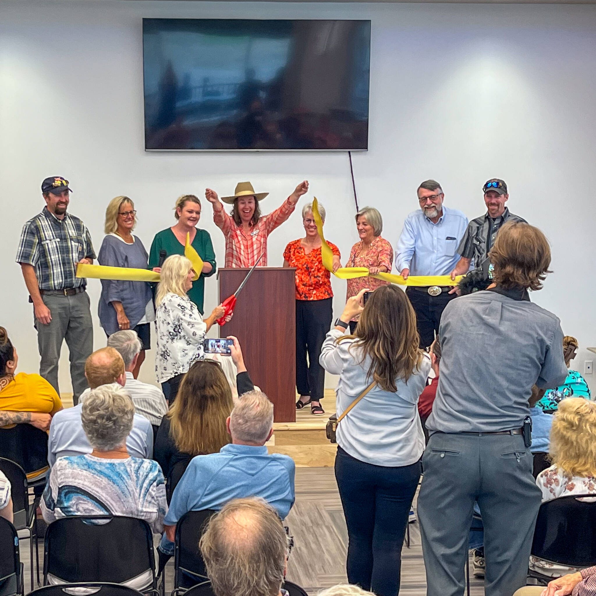 Arlene Harms and the Board of Directors cut the ribbon at the grand opening of the Rio Grande Hospital Wellness Center.