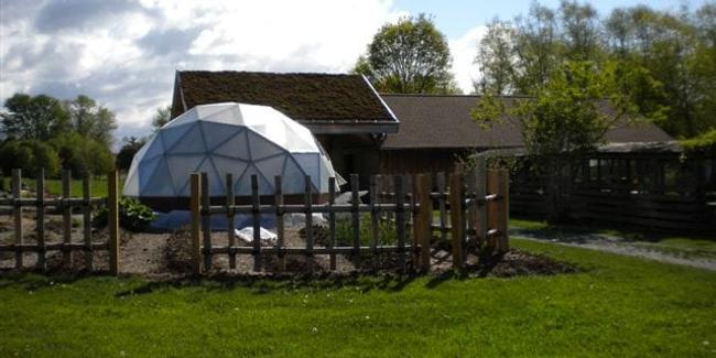 Growing Dome beside gardens and outbuildings at the Rodale Institute in Pennsylvania