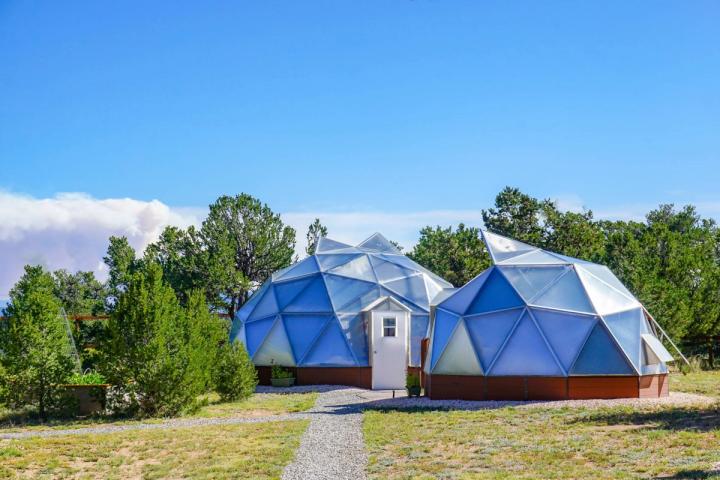 Two growing dome greenhouses