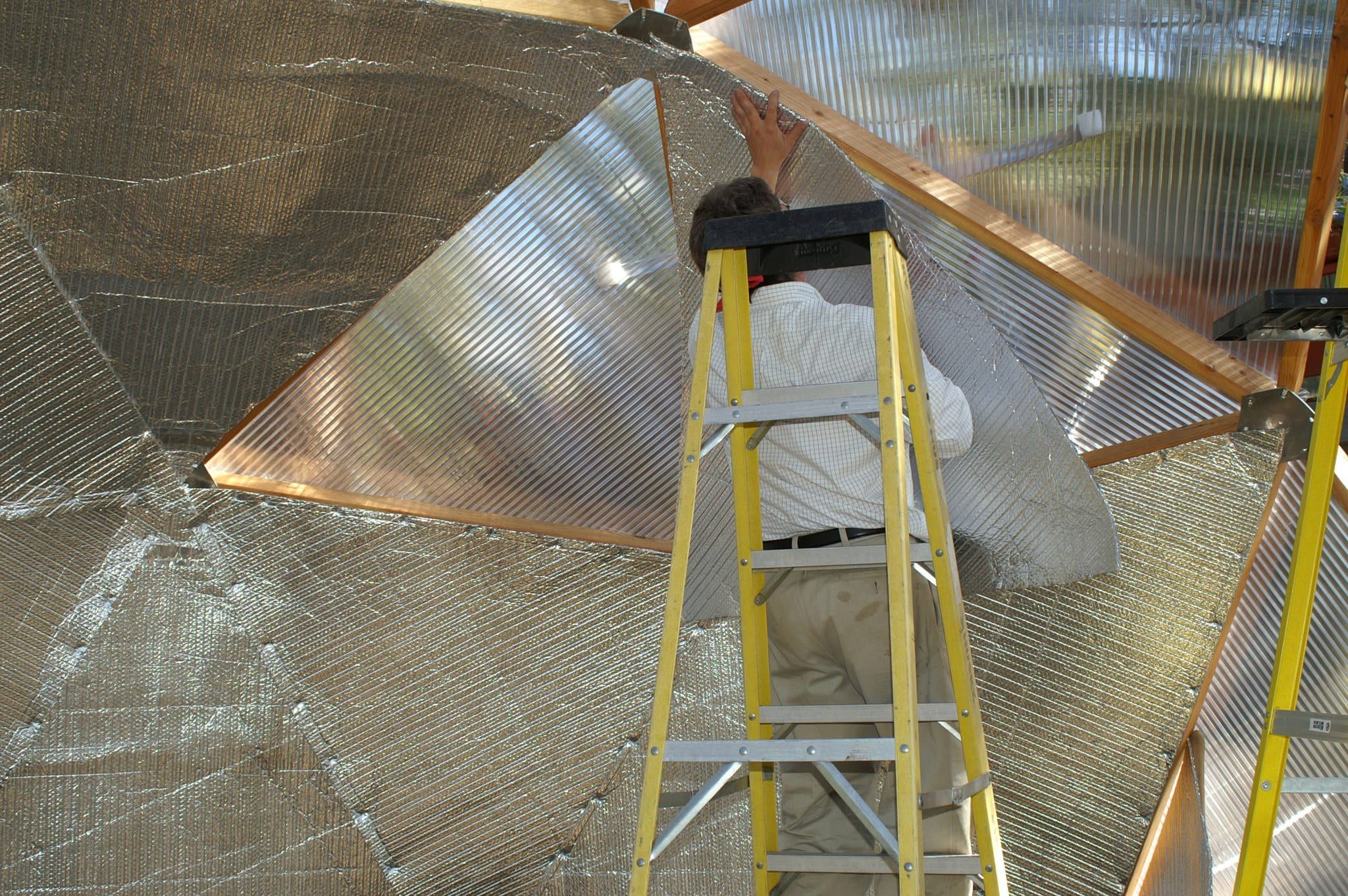 Installing the reflectix on north wall
