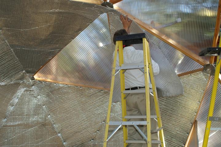 Installing the reflectix on north wall