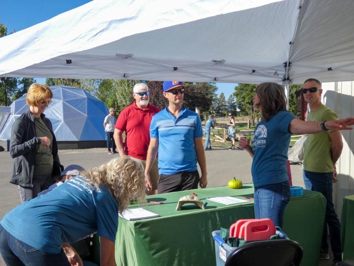 the check-in tent at the 2024 Customer Appreciation Event