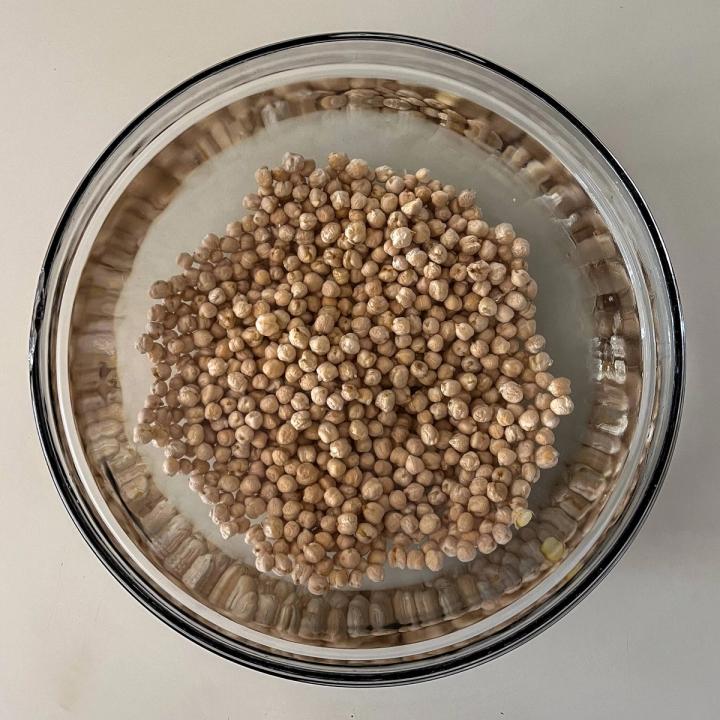 soaking dried chickpeas in water